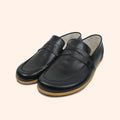 Grounding Shoes Penny Loafer Style with Conductive Copper Rivet Handmade with Natural Charcoal Black Top-Grain Leather and Water Buffalo Leather Soles That Are Easy To Slip On Shown in Diagonal View