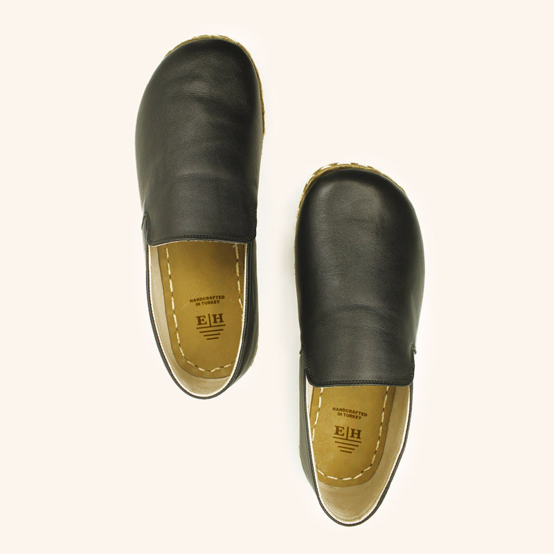 Grounding Slip On Unisex Shoes that are handmade with Natural Black Top-Grain Leather and Water Buffalo Leather Soles Shown From Top View