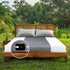 premium grounding bed sheets - Gray grounding sheets arranged on a rustic wooden bed outdoors, human body, autoimmune diseases
